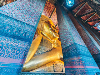 Wat Pho Temple. Lying Buddha statue Bangkok Thailand. 