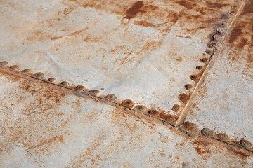 Rusty metal sheets with rivets for background textures
