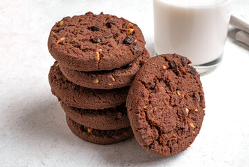 Stack of Chocolate chip cookies and glass of milk