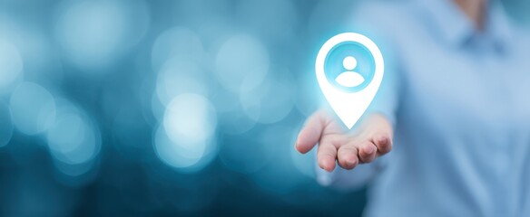 The hand presenting a digital location pin symbolizing connectivity and user engagement.