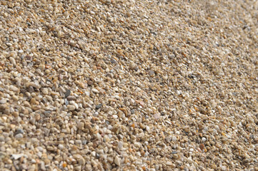 Natural gravel texture in a construction site during daylight hours