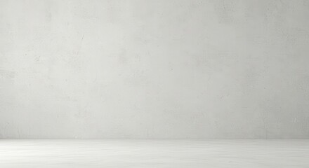 Monochromatic room with textured plaster wall  subtle lighting