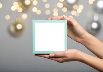 Obraz premium Woman Hands Holding Blank Gift Box Mockup Celebration Present