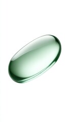 A single, translucent, pale-green capsule or gel-cap, glossy and ovular, isolated on a white background