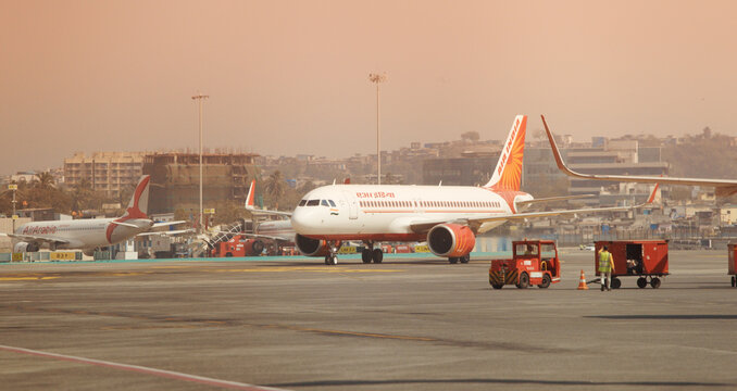 Mumbai, Maharashtra, India. An Air India Airlines plane in motion in the airport area. Aircraft driving in BOM Chhatrapati Shivaji Maharaj International Airport area.