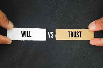 Paper with the words trust vs will. living trust might be more than you need for your situation,...