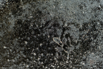 Rust stains on cast iron surface, macro