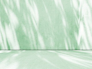 Green background light shadow leaves abstract nature on blur wall cement podium product, studio...