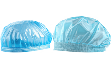 Two Light Blue Disposable Hairnets On Transparent Background