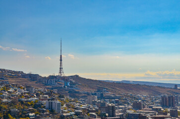 Yerevan TV tower and Nork hill in autumn scenic view from Victory Park