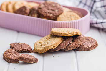 Sweet oatmeal cookies on white table.