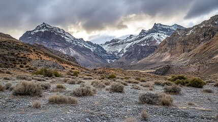 mountain landscape with snow and clouds
