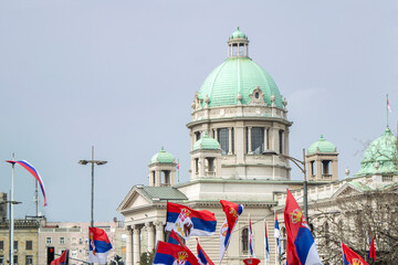 House of the National Assembly in Belgrade Serbia surrounded with many flags