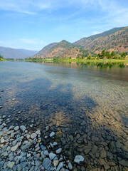 Mountains tower over the Flathead River in Montana, USA