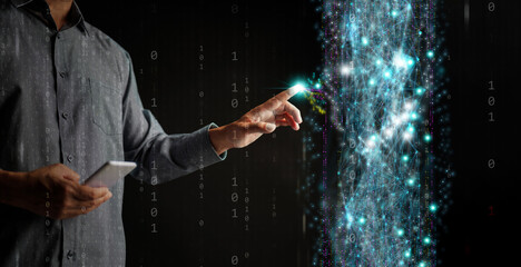 Digital technology and big data are accessible to individuals. A man with a smartphone interacts...