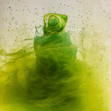 Vibrant ink creates mesmerizing tornado shapes in water