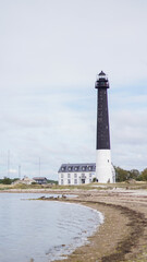 Black and white Sorve lighthouse in Torgu Parish on in the island of Saaremaa, Estonia.