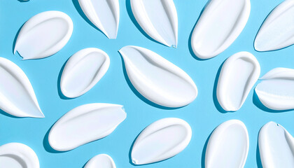 Creamy Texture of Cosmetic Samples on Soft Blue Background &ndash; Skincare Product Swatches,Cream	
