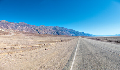 Road in the Death Valley National Park at badwater basin, california USA