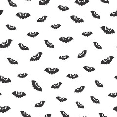 Cute bat flat seamless pattern. Happy Halloween party print with flying bat silhouette. Vector illustration for holiday wrapping, kids fabric, holiday decoration, textile, wallpapers, background