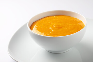 Aam ras served in ceramic bowl. Delicious Indian dessert