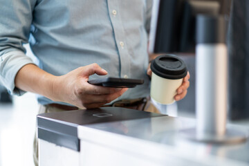 Pass through the automatic turnstile using a mobile phone