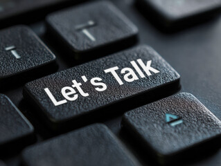 Keyboard key says Let's Talk for communication