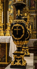 Ornate Black Vase with Golden Cross