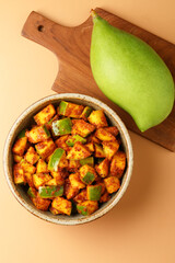 Mango Pickle Homemade Mango Pickle or aam ka achar or achaar in white bowl, selective focus
