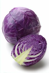 Fototapeta premium Whole cabbage red purple and one cross-section slice. Clean white background