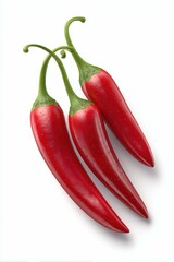 Three whole chili peppers on white