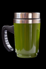 Green travel sippy thermal mug on black background
