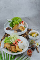 Traditional Indonesian Delicacies: Duck Rice and Malon Bird Dish