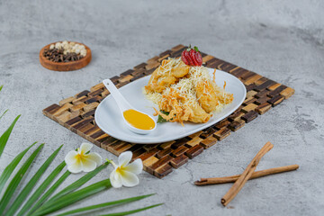 Indonesian Fried Banana with Cheese Topping