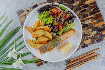 Salmon salad with french fries