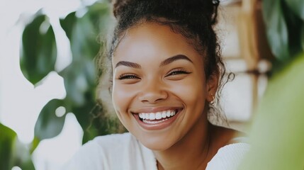 Happy woman smiling outdoors, greenery background, beauty portrait