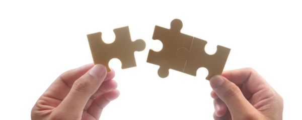 Collaboration and problem solving studio image bright close-up puzzle pieces fitting together