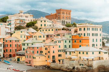 Colorful houses overlooking the mediterranean sea in boccadasse, genova, italy