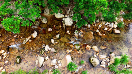 Obraz premium Aerial Drone Footage of a Clear Mountain Stream Flowing Through Mungyeong Countryside in Late Spring and Early Summer, Korea