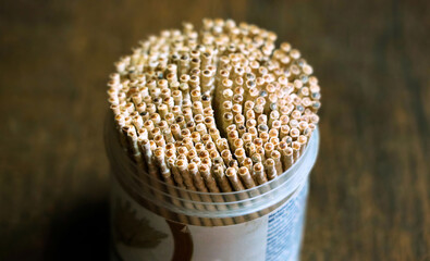Selective focus of toothpicks placed on a table