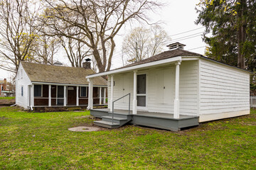 The building of the first post office and the Thomas House in Lakeside Park in early spring. Lakeside Park, Oakville, Ontario, Canada.