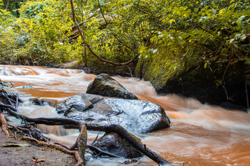 Long exposure view of Nairobi River at the waterfalls in Karura Forest, Nairobi, Kenya. 