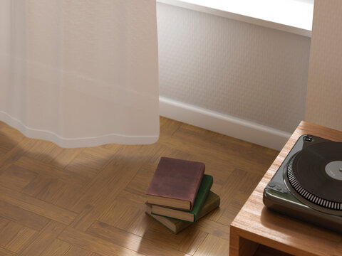 Cozy home interior with books and a vinyl player on a wooden floor