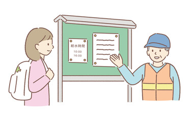 避難所の掲示板を確認する女性