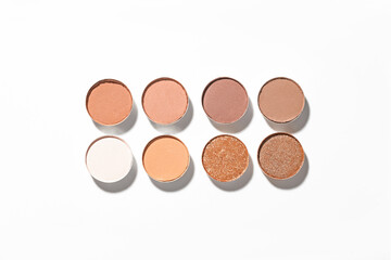 Beautiful eyeshadow refill pans on white background, flat lay