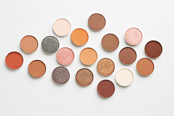 Beautiful eyeshadow refill pans on white background, flat lay