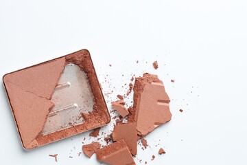 Broken eyeshadow refill pan on white background, top view. Space for text