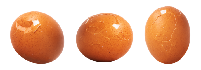 collection of chicken eggs with cracked shells with ...