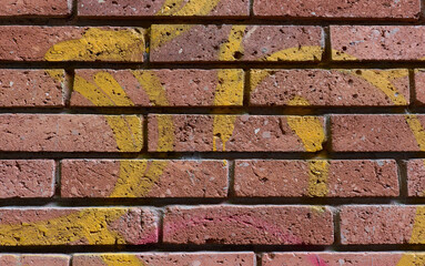 Colorful graffiti art on brick wall adds urban vibe