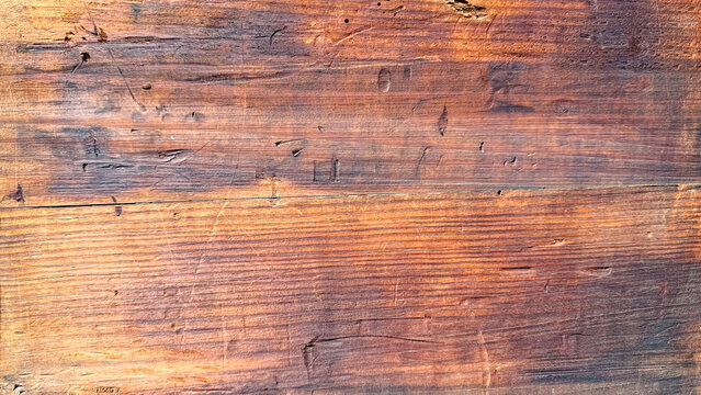 Rugged wooden texture evokes warmth of autumnal Hygge gatherings, reminiscent of ancient Celtic Samhain bonfires and rustic charm